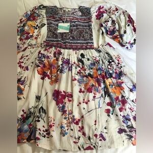 Woman’s new with tags size large UMGEE DRESS